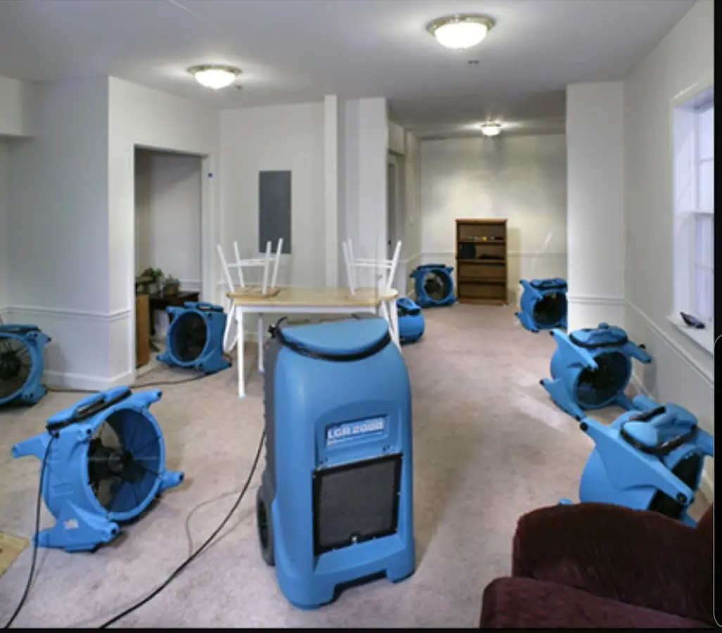 Air movers and dehumidifier setup for Water Damage Restoration in Mankato